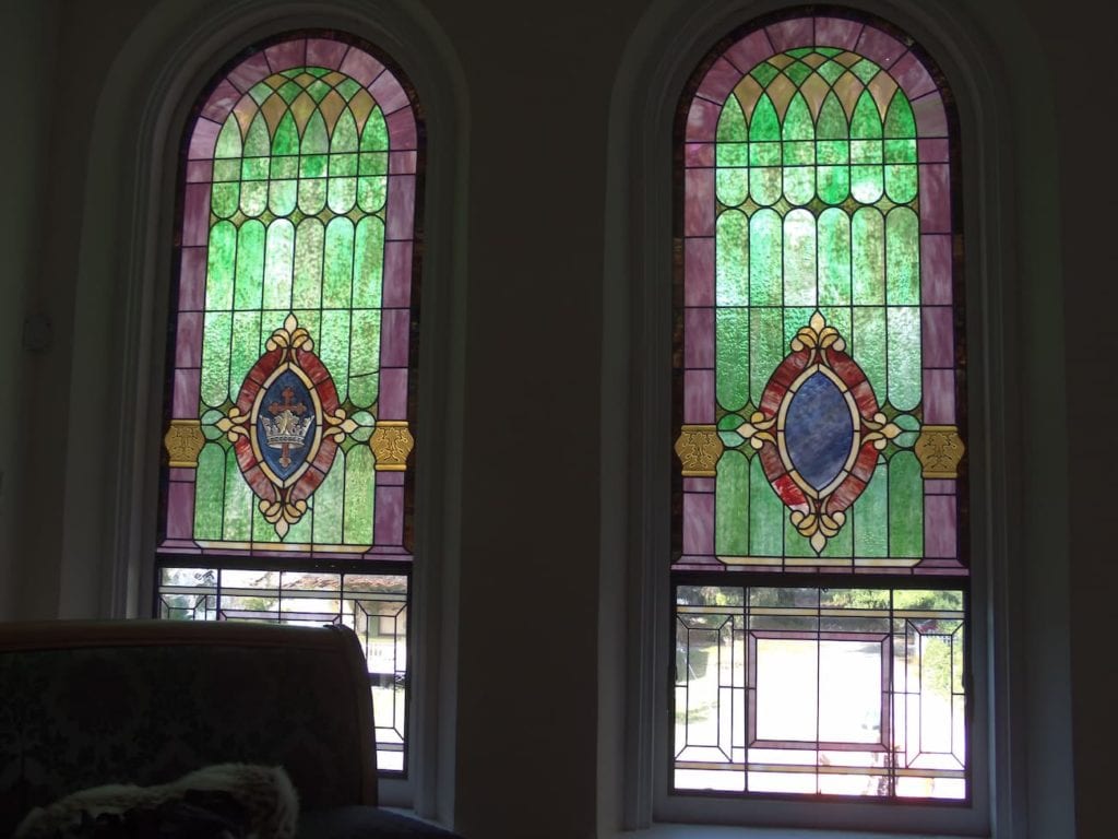 Stained glass viewed from the interior of a church