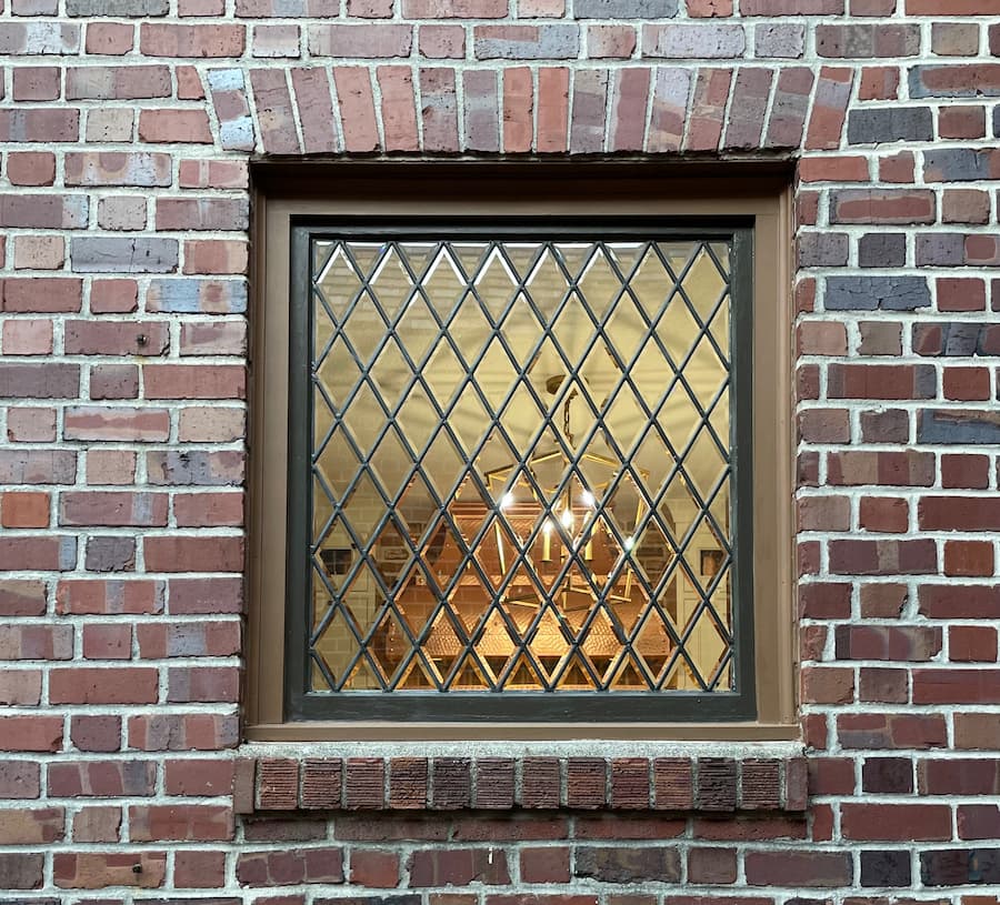 Stained glass window design viewed from the interior of a home
